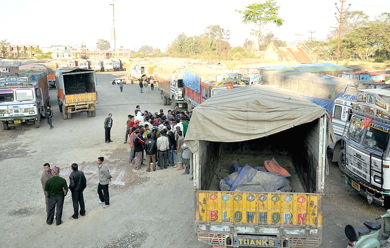 Stranded requisitioned trucks on FCI duties at Khuman Lampak on Monday.
