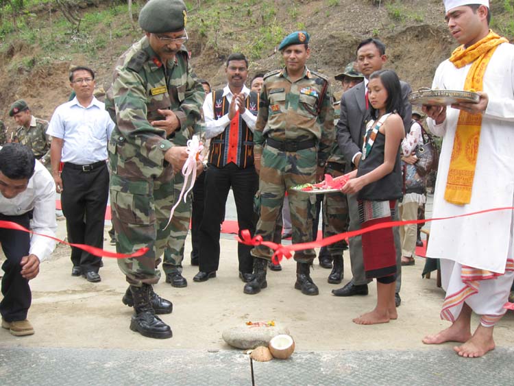 Brig Narendra Kumar, DIG 17 AR cutting the ribbon while inaugurating the suspension bridge at Chalou village.
