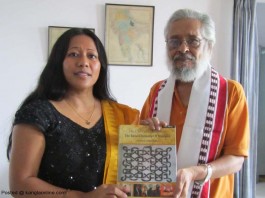 Ms Binalakshmi Nepram presenting the book Cheitharol Kumbaba The Royal Chronicle of Manipur by Nepram Bihari to Prof Basudev Chatterji Chairman of ICHR