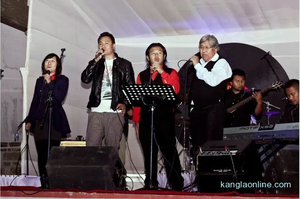 Chief Guest of The Beatles Mania Show, Dr Nicky Kire (right), Parliamentary Secretary, Law and Justice, Land Revenue, Labor and Employment, singing together with the 3 bands on the stage amidst cheers from the capacity crowd on Saturday night at The Heritage, Kohima.