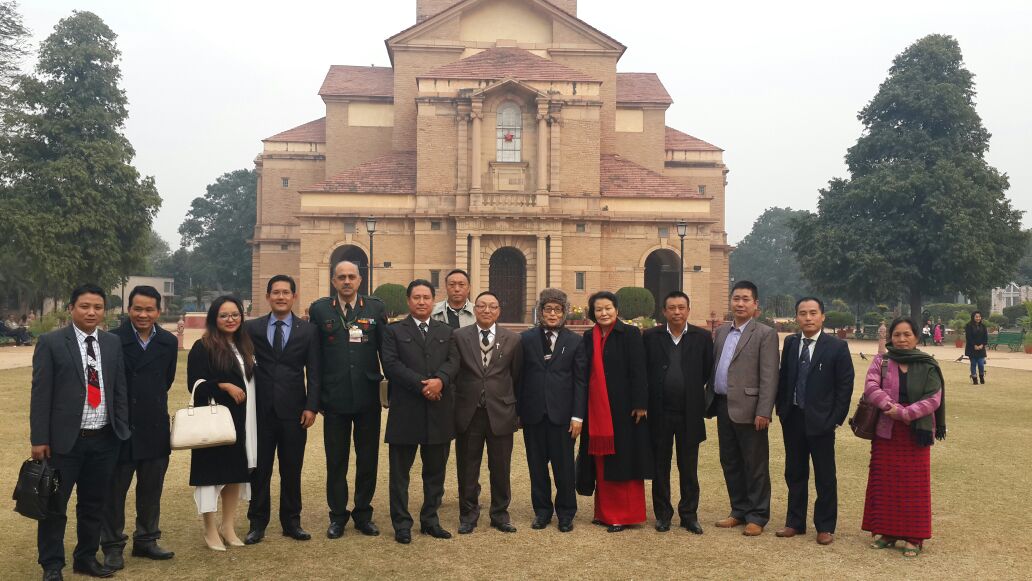 Nagaland Minister for National Highways and Mechanical Engineering Nuklutoshi (6th left) with Ao Church leaders and invitees during a grand New Year program for the Aos living in and around Delhi at Delhi on January 1, 2015.