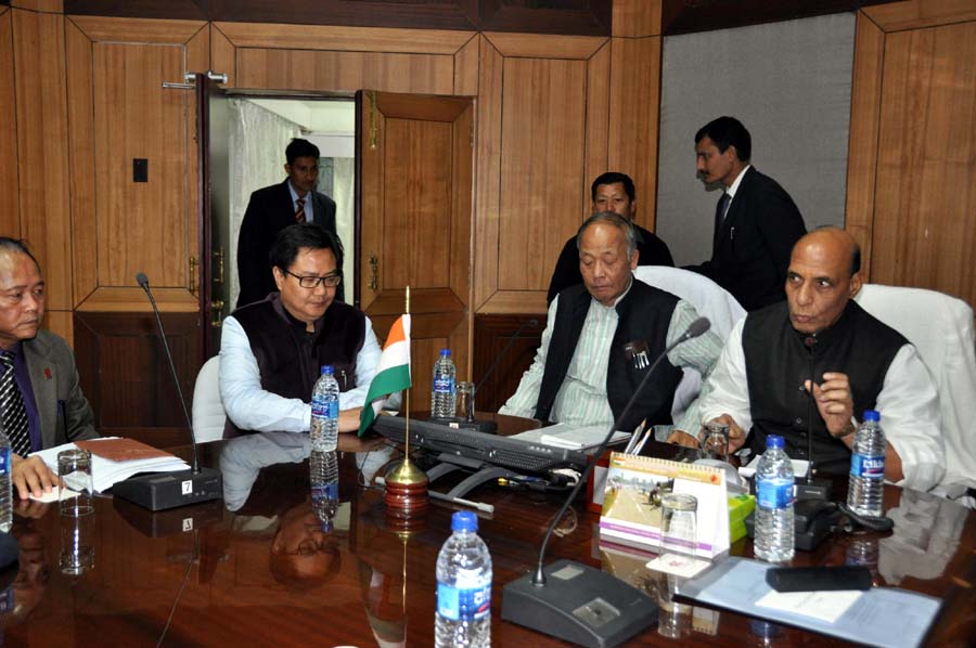 Union Home Minister Rajnath Singh,Chief Minister Okram Ibobi and Union Minister of State for Home, Kiran Rijiji at a meeting.