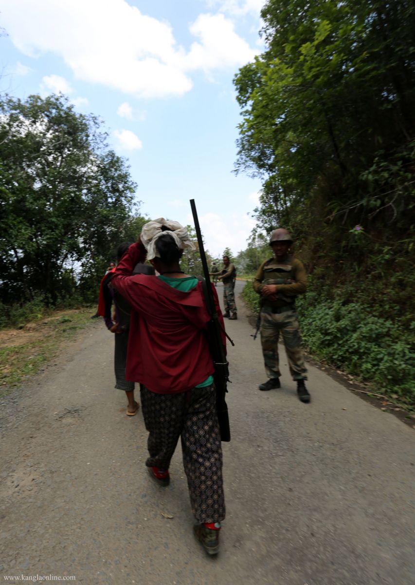 Villagers roaming around with air gun at the ambush site at Paraolon, Chandel District, Manipur. Photo by Deepak Shijagurumayum.