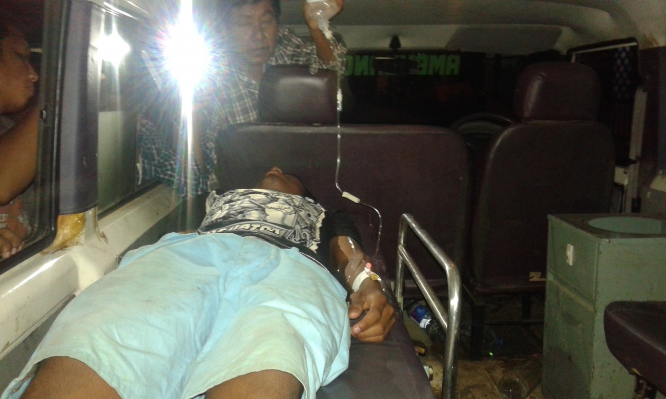 An injured protester in ambulance.