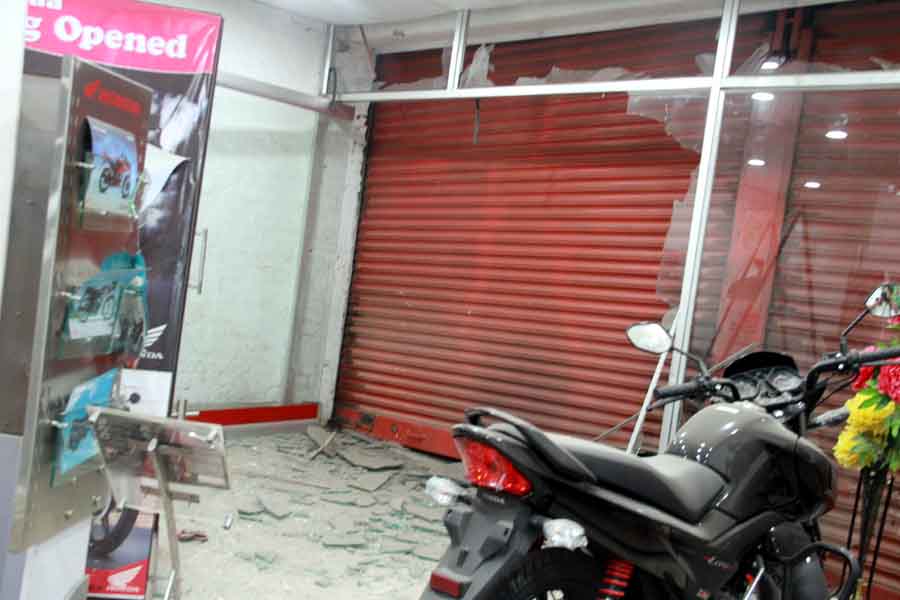 Blast damaged portion of Punya Hyundai showroom at Thangmeiband road opposite ABC godown. IFP Photo