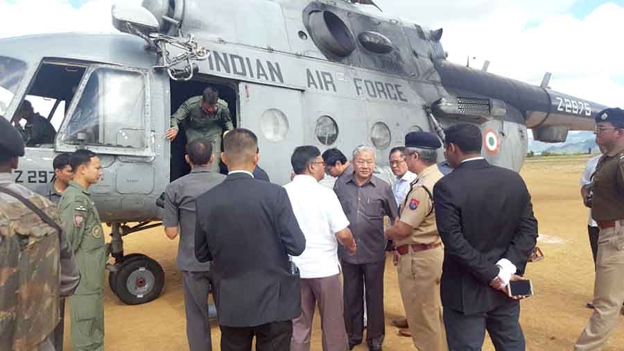 Deputy Chief Minister Gaikhangam and other ministers interact with police officials at the Ukhrul helipad