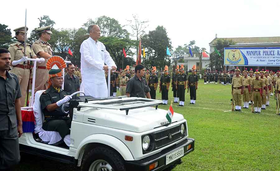 Okram Ibobi inspects guard of honour during the observance of the 125th Raising Day Parade of Manipur Police