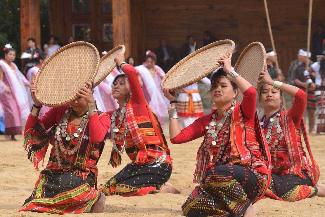 Artist from Tripura perform a cultural dance on the second day of the state annual Hornbill Festival at Naga Heritage village Kisama, some 15 kms away from Kohima, Nagaland on Friday, December 02, 2016. Photo by Caisii Mao